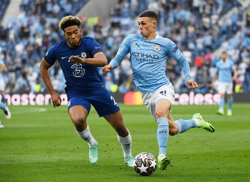 City's Phil Foden on the attack being chased by Reece James of Chelsea.