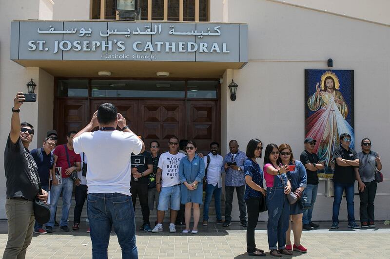 Abu Dhabi, United Arab Emirates. April 14, 2017///

Worshippers take photos outside St. Joseph's church. Good Friday services at St Joseph, St Theresa, and St Antony Cathedral, churches. Mushrif Area. Abu Dhabi, United Arab Emirates. Mona Al Marzooqi/ The National 

ID: 65926
Reporter: Anwar HajiKaram
Section: National  *** Local Caption ***  170414-MM-EasterChurch-011.JPG