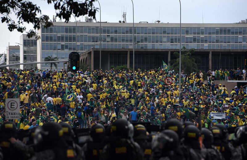 Supporters of Jair Bolsonaro invading several governmental building are confronted by the security forces in Brasilia. AFP