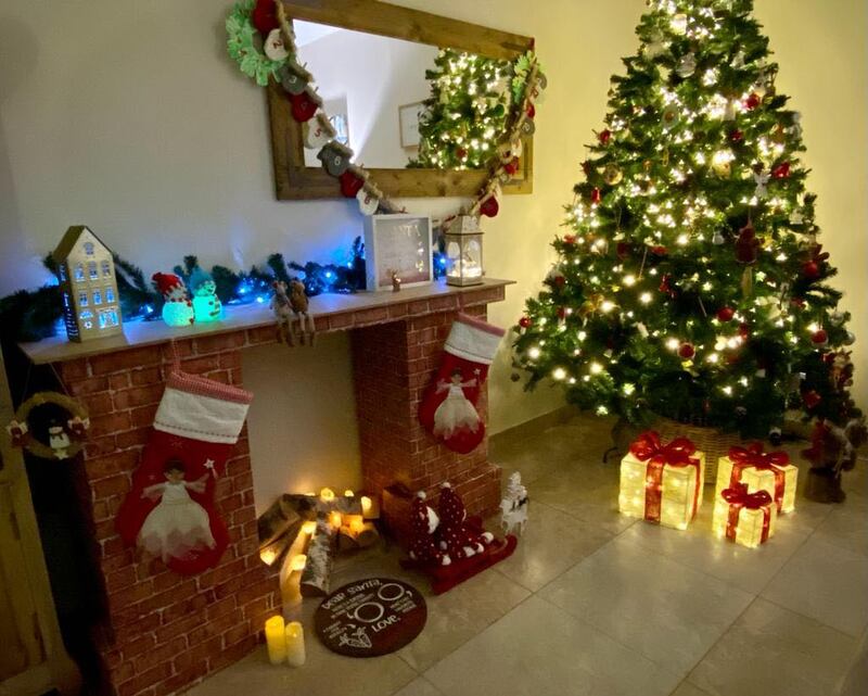 UAE resident Annabelle Kelly has made a festive fireplace out of Kibson boxes. Photos: Annabelle Kelly