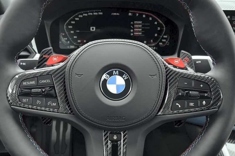 The Alcantara-clad steering wheel.