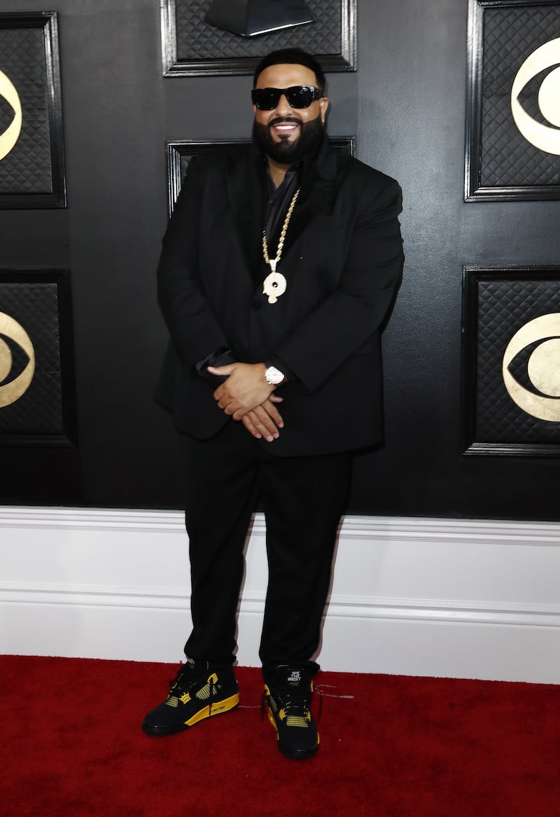 DJ Khaled wears classic black with trainers. EPA 