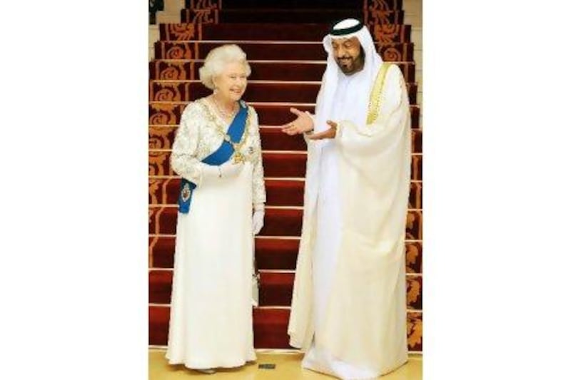 Sheikh Khalifa bin Zayed, President of the UAE and Ruler of Abu Dhabi, welcomes Queen Elizabeth II at the Mushrif Palace.