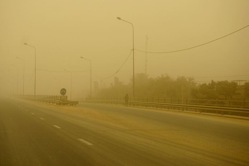 A deserted road during a spring sandstorm in Baghdad. AFP