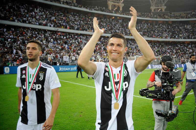 Ronaldo and his teammates celebrate post-match. Getty