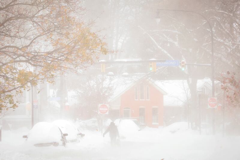 A resident walks on the street during a snowstorm as extreme winter weather hits Buffalo, New York. Reuters