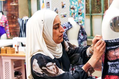 Since childhood, the reliable rules and rhythms of sewing have become a comfort for Al-Allak. Photo: BBC