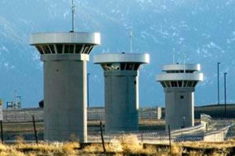 Guard towers loom over the administrative maximum security facility, the highest security area at the Federal Prison in Florence, Colo., Wednesday, Feb 21, 2007. U.S. Attorney General Alberto Gonzales toured the prison, known as the Supermax, with Colorado state and federal legislators following complaints by staff and local residents about the level of security at the facility. (AP Photo/Pueblo Chieftain, Chris McLean)