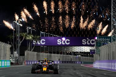 Red Bull driver Sergio Perez of Mexico dives the history lap after he won the Saudi Arabia Formula One Grand Prix at the Jeddah corniche circuit in Jeddah, Saudi Arabia, Sunday, March 19, 2023.  (AP Photo / Luca Bruno, Pool)