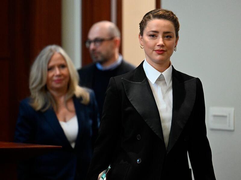 Amber Heard enters the courtroom. AP