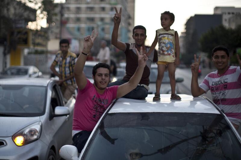 Traffic packed out Gaza’s cities, with hundreds of vehicles careering around tooting horns. Mahmud Hams/AFP Photo
