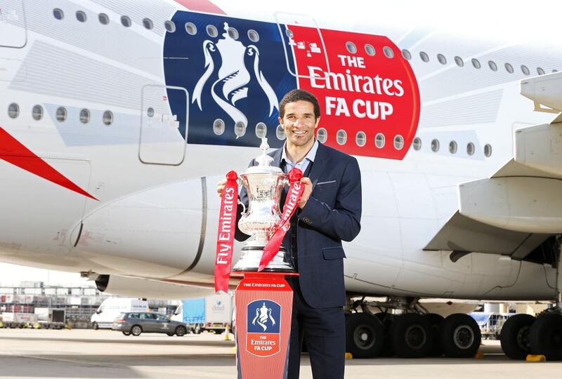 The Emirates FA Cup plane was met on the other side by FA Cup winner David James. Courtesy Emirates