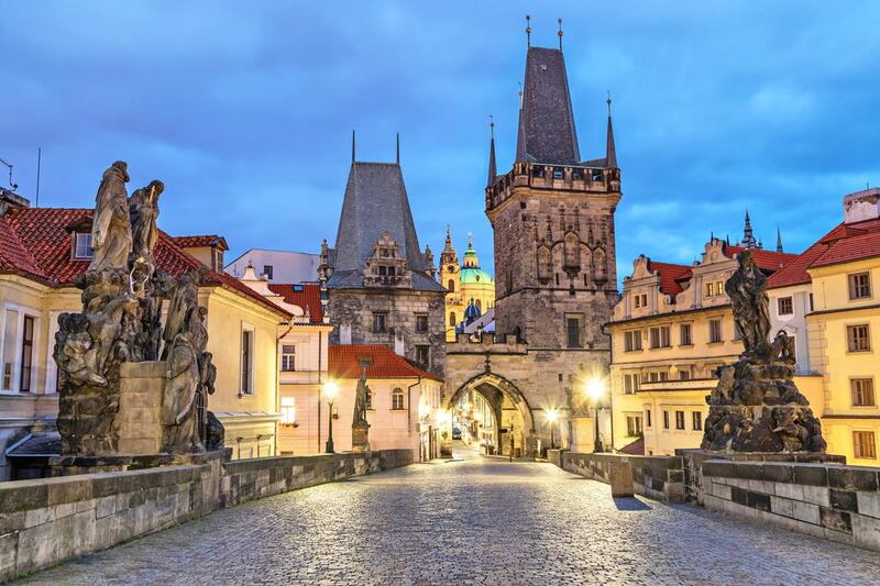 The Charles Bridge, which overlooks the Vltava River, is the entrance point to Malá Strana in Prague. Sergey Dzyuba / Alamy Stock Photo 