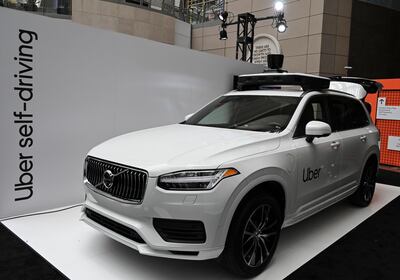 An Uber self-driving Volvo is on exhibit at the Uber Elevate Summit 2019 in Washington, DC June 12, 2019. - Uber unveiled its newest self-driving vehicle produced by Volvo Cars. The Volvo XC90 prototype will be "capable of fully driving itself," according to an Uber statement, with  sensors atop and built into the vehicle to allow it to operate and maneuver in an urban environment. (Photo by EVA HAMBACH / AFP)