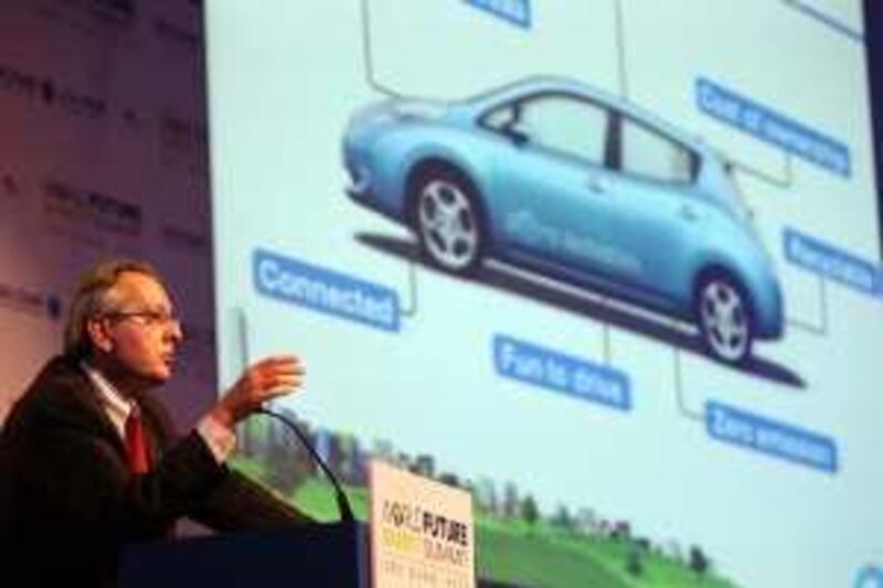 ABU DHABI  20th January 2010. WORLD FUTURE ENERGY SUMMIT. DAY 3. Pierre Loing, from Nissan with an image of Nissan's first mass market electric vehicle at the World Future Energy Summit in Abu Dhabi yesterday(weds)  Stephen Lock   /  The National  .  *** Local Caption ***  SL-energydaythree-015.jpg