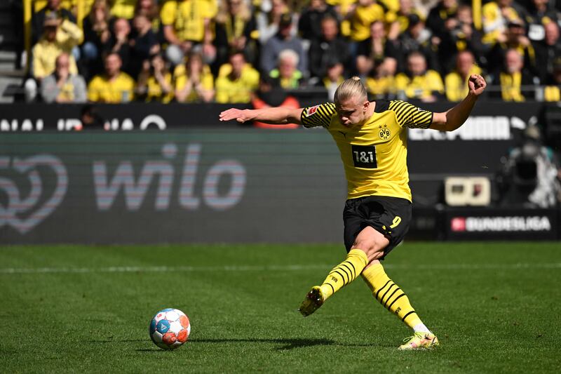 Dortmund forward Erling Haaland scores from the spot during the Bundesliga match against VfL Bochum in April, 2022. AFP