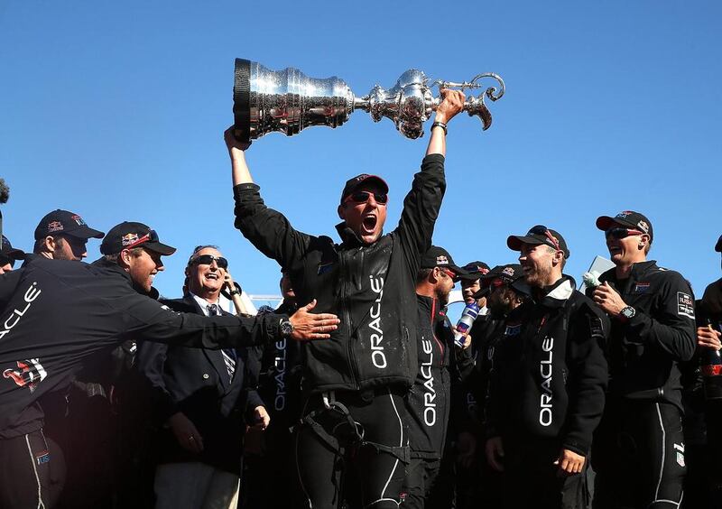 Oracle Team USA, with captain by James Spithill, celebrates onstage after defending the America's Cup as they rallied to win eight straight and beat Emirates Team New Zealand at San Francisco bay.   Justin Sullivan / AFP