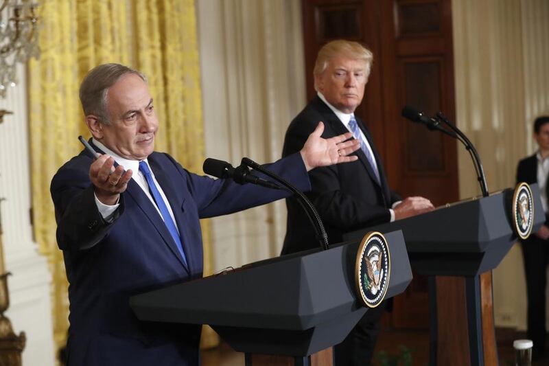US president Donald Trump and Israeli prime minister Benjamin Netanyahu give a joint news conference at the White House in Washington. Pablo Martinez Monsivais / AP Photo