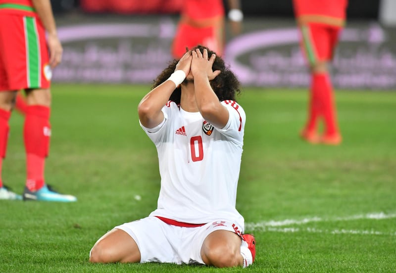The UEA's player Omar Abdulrahman reacts during the Gulf Cup of Nations 2017 final football match between Oman and the UAE at the Sheikh Jaber al-Ahmad Stadium in Kuwait City on January 5, 2018. / AFP PHOTO / GIUSEPPE CACACE