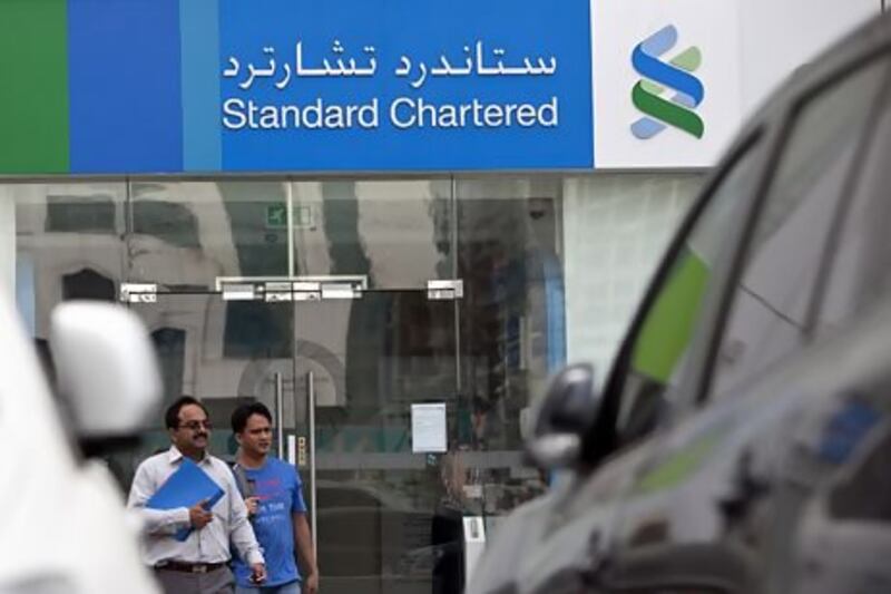 Standard Chartered has operated a representative office in Erbil since 2006 but is looking to expand its presence. Above, a bank branch in Abu Dhabi. Silvia Razgova / The National