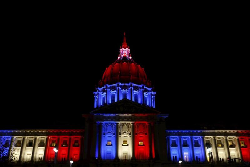 The San Francisco City Hall is lit up with the colors of the French flag in solidarity with France. Stephen Lam/Reuters