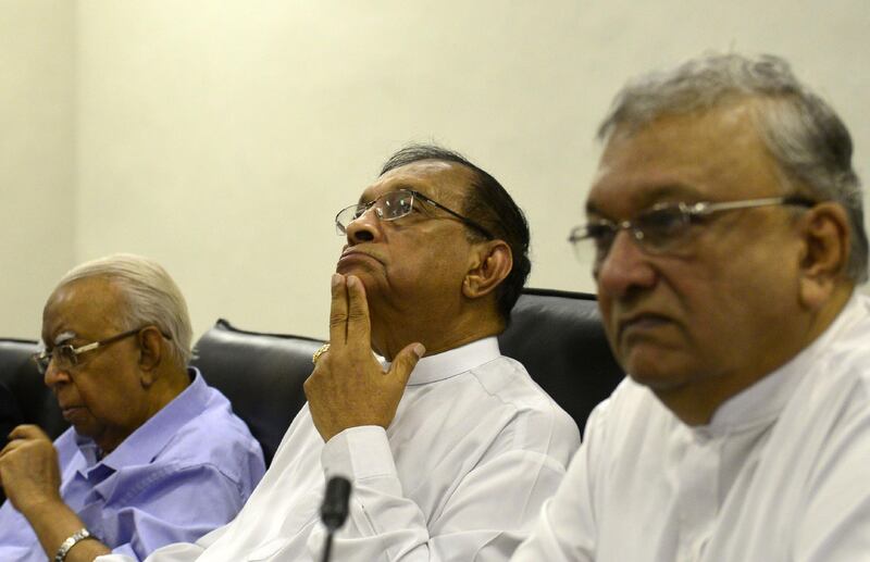 Sri Lanka's parliament speaker Karu Jayasuriya, centre, looks on at a meeting of MPs at the Parliament Building in Colombo.  AFP
