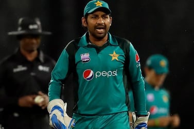 Pakistan captain Sarfraz Ahmed was banned by the ICC for four games after a a stump microphone picked up racist comments he made towards South Africa's Andile Phehlukwayo during a recent series. AP Photo