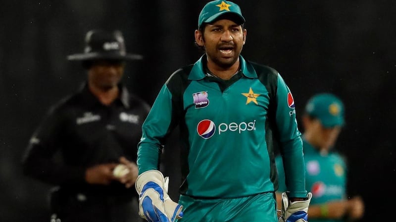 Pakistan captain Sarfraz Ahmed was banned by the ICC for four games after a a stump microphone picked up racist comments he made towards South Africa's Andile Phehlukwayo during a recent series. AP Photo