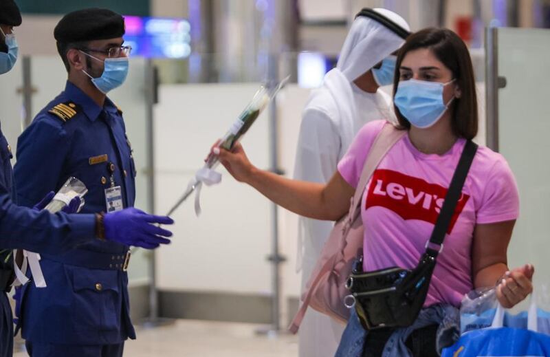 Passengers from Beirut were presented with flowers upon arrival at Dubai International Airport last night. Courtesy: Dubai Customs