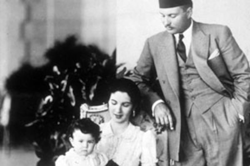 Farouk I, the King of Egypt, with wife Queen Farida and their one-year-old daughter, Princess Ferial Farouk, in 1939.
