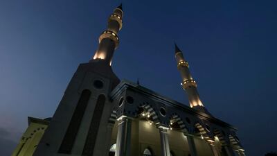 Night falls over Al Farooq Omar Bin Al Khattab Mosque in Dubai during Ramadan. Antonie Robertson / The National