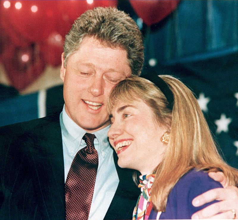 A 1992 photo shows then Governor of Arkansas Bill Clinton (L) and his wife Hillary (R) embracing. Clinton has been accused of having an affair with a former White House intern, Monica Lewinsky, and during a depostion 17 January in the Paula Jones sexual harrassment suit, he admitted to having a relationship with Gennifer Flowers when he was governor. (Photo by AFP)