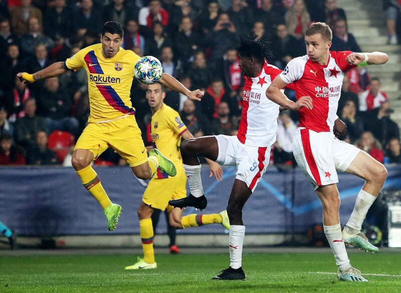 Luis Suarez, left, scores Barca's second goal. EPA