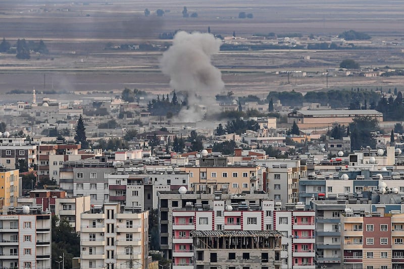 This picture taken from the Turkish side of the border at Ceylanpinar district in Sanliurfa shows smoke rising from the Syrian town of Ras al-Ain on the first week of Turkey's military operation against Kurdish forces. The United States is not aware of any "major" escape of Islamic State extremists since Turkey launched its assault on Syrian Kurdish fighters holding the prisoners, an official said Tuesday. AFP