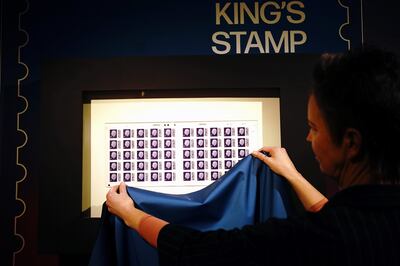 One of the first sheets of the 1st class definitive stamp featuring King Charles III is unveiled as it goes on display at the Postal Museum in central London. PA 