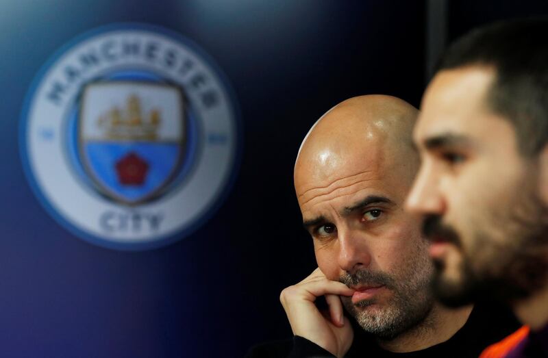 Soccer Football - Champions League - Manchester City Press Conference - Etihad Campus, Manchester, Britain - March 11, 2019   Manchester City manager Pep Guardiola and Ilkay Gundogan during a press conference   Action Images via Reuters/Lee Smith