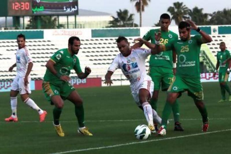 Luiz Fernando Da Silva, centre, finds himself surrounded by three Al Shabab defenders in their 5-1 loss to the hosts on Monday afternoon.