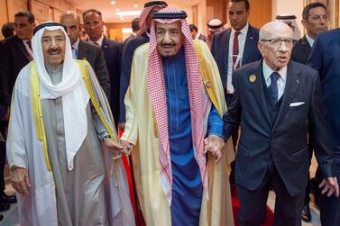 epa07476247 A handout photo made available by the Saudi Royal Palace shows Saudi King Salman bin Abdulaziz Al Saud (C), Emir of Kuwait Sheikh Sabah Ahmad Al-Jaber Al-Sabah (L) and President of Tunisia Beji Caid Essebs (R) attending the Arab Summit in Tunis, Tunisia, 31 March 2019. Arab leaders are holding their 30th annual summit in Tunis and are expected to discuss the US recognition of Israelâ€™s sovereignty on Golan heights and developments in Syria, Yemen and Libya. EPA/BANDAR ALGALOUD HANDOUT HANDOUT EDITORIAL USE ONLY/NO SALES