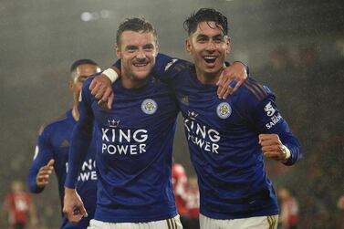 Leicester City's English striker Jamie Vardy, left, celebrates scoring his team's fifth goal with Leicester City's Spanish striker Ayoze Perez during the English Premier League football match between Southampton and Leicester City at St Mary's Stadium in Southampton on October 25, 2019. AFP