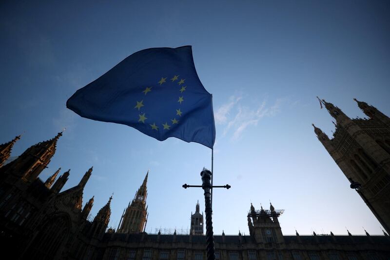 An EU flag flutters during an anti-Brexit demonstration outside the Houses of Parliament in London, Britain January 28, 2019. REUTERS/Hannah McKay