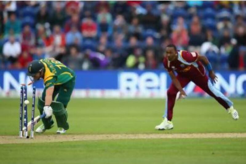 Dwayne Bravo runs out Faf Du Plessis in Cardiff. Michael Steele / Getty Images