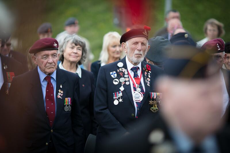 Normandy veterans attend a wreath laying ceremony at the Tactical Air Force Memorial besides Omaha Beach. Matt Cardy / Getty Images