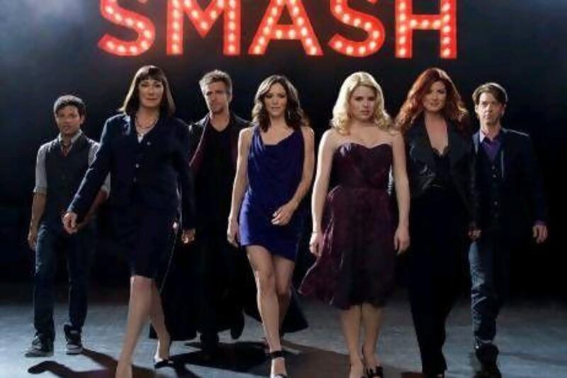 From left, Jaime Cepero, Anjelica Huston, Jack Davenport, Katharine McPhee, Megan Hilty, Debra Messing and Christian Borle.