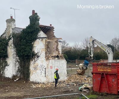 The Banksy work on a Kent farmhouse lies in rubble on March 15. PA