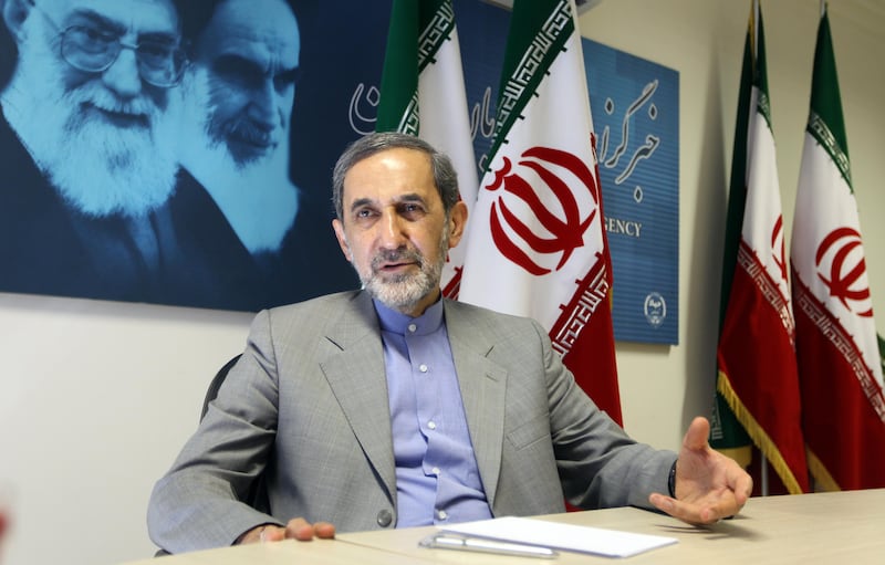 Iranian advisor to the supreme leader Ayatollah Ali Khamenei and hopeful conservative presidential candidate, Ali Akbar Velayati, speaks to the interview with AFP  in Tehran, on June 3, 2013. Iran’s former foreign minister Velayati would "cooperate" with France to resolve the conflict in Syria should he win the June 14 presidential election, he said in an exclusive interview with AFP. AFP PHOTO/ATTA KENARE