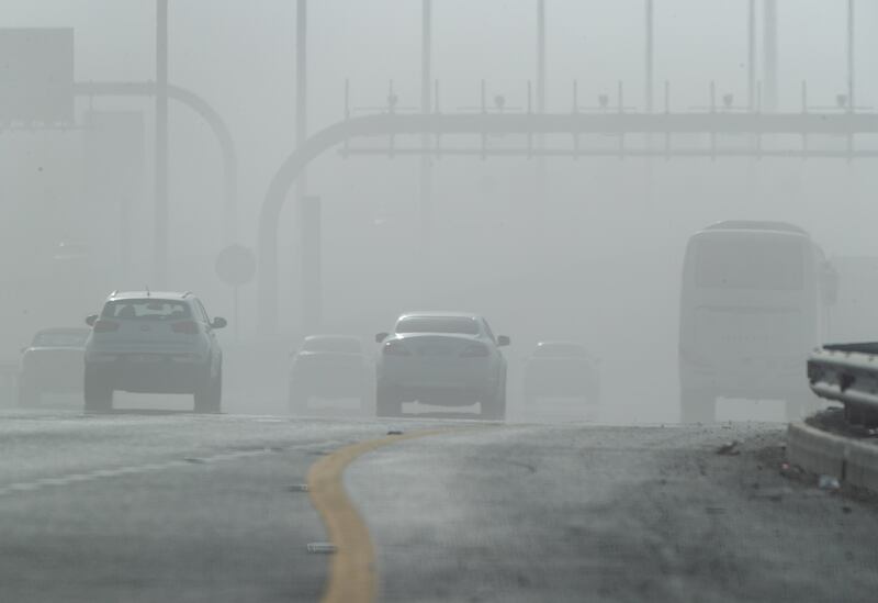 The sandstorm has reduced visibility on the E12 highway in Abu Dhabi. Victor Besa / The National
