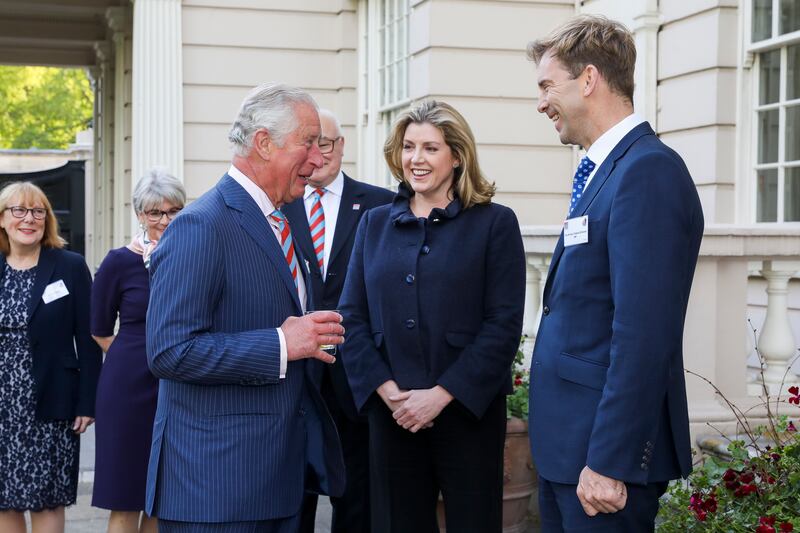 Prince Charles meets Penny Mordaunt and MP Tobias Ellwood at a reception at St James's Palace, London, in 2019. Getty Images