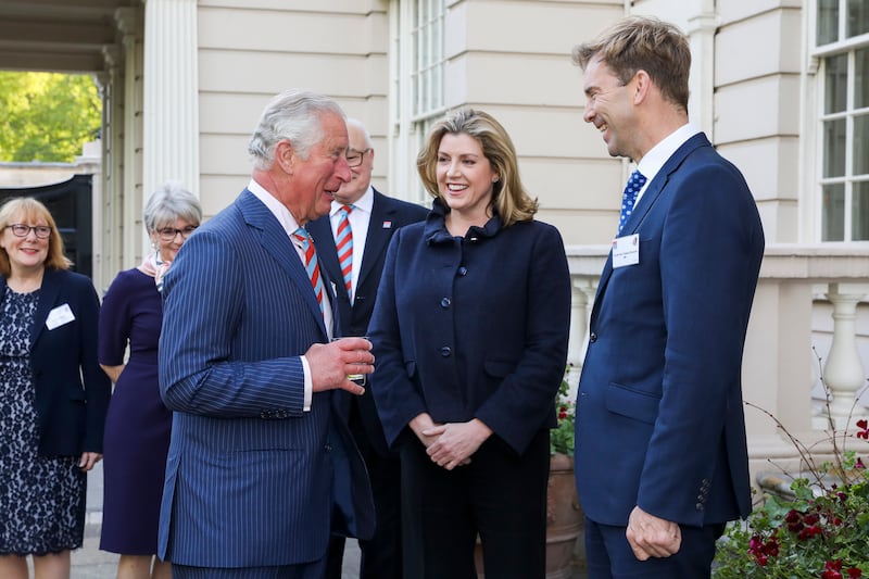 Prince Charles meets Penny Mordaunt and MP Tobias Ellwood at a reception at St James's Palace, London, in 2019. Getty Images