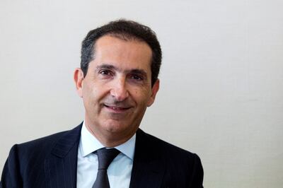 Patrick Drahi is unlikely to spend billions for a passive, minority stake in BT. AFP