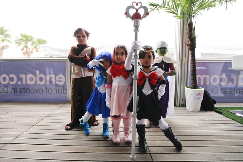 A group of tiny costumed characters pose for a photograph at the Middle East Film and Comic Con in Dubai on April 5, 2013. Sarah Dea / The National